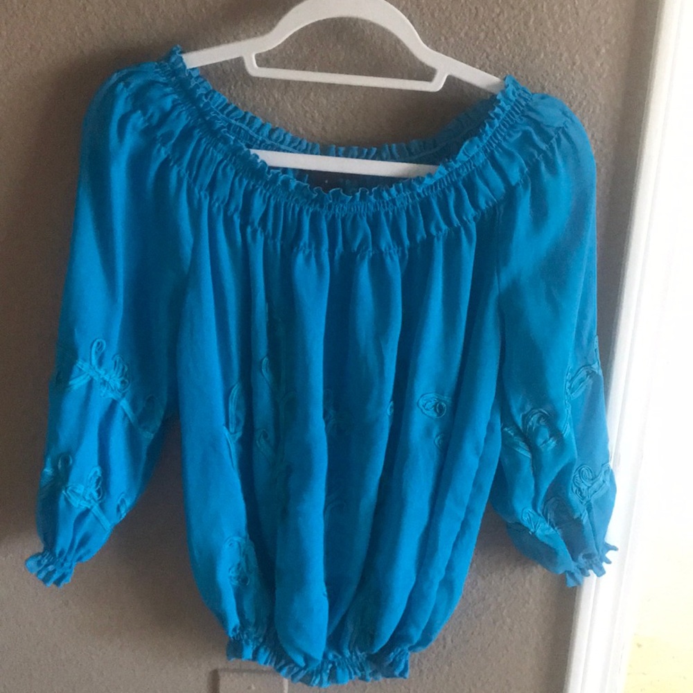 Inc off the shoulder top